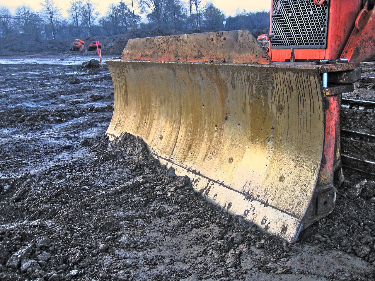 Excavator working glacial cobble ground in the Gallatin Valley near Bozeman